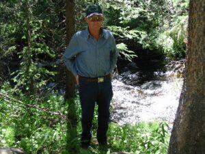 Scotty Moser in front of Boulder Creek