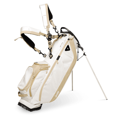 A full front shot of standing Ryder golf bag in toasted almond with double strap